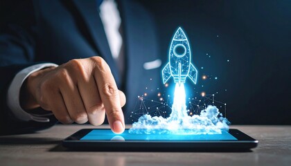Businessman launches innovative startup with digital rocket on a tablet device. Concept for startup development, innovation solution and boost performance