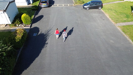 Stunning aerial shot of holiday caravans lined in patterns across parkland – versatile for...