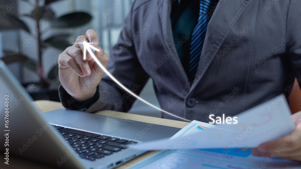 Aufkleber sales performance analysis concept. businessman reviewing sales data and performance metrics to eval
