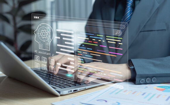 Programmer using laptop with AI code assistant. Code editing and programming support showcasing artificial intelligence in software development and automated code generation.