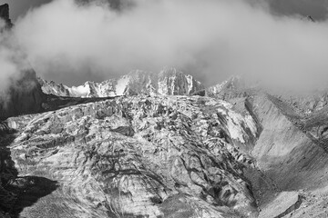 Kyrgyzstan high mountains, black and white photo, difficult mountain routes in mountaineering