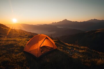 Camping Tent on Mountain Ridge at Sunset