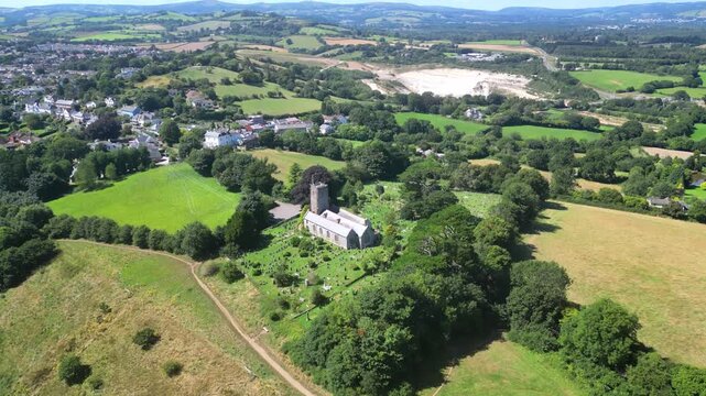 Highweek, South Devon, England: DRONE VIEWS: All Saints Church, Highweek village, ball clay quarry and Dartmoor National Park. The village overlooks the 13th century market town of Newton Abbot (2).