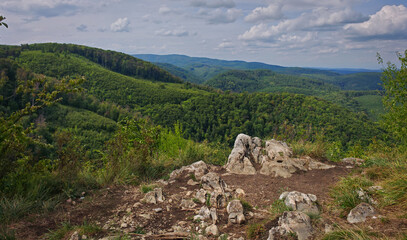 Panoramic view from Gulicska-tető peak in the Bükk Mountains, Hungary, with forested valleys and...