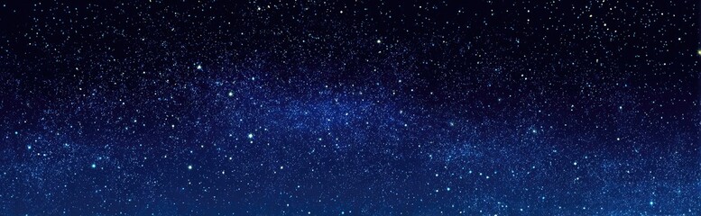 A dark night sky filled with countless twinkling stars