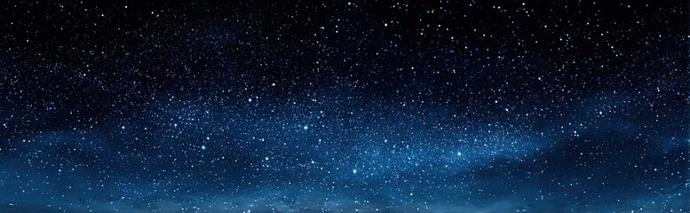 Deep night sky, densely studded with glittering stars, fading into a soft, hazy twilight at the horizon