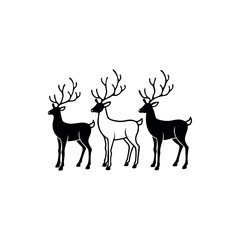 Naklejka premium Three elegant deer with antlers, two in black and one in white silhouette Vector 
