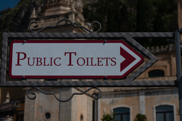 Lavatory sign in old city center