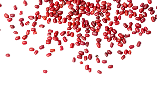 The High-resolution photo of red bean seeds, piled and scattered on the ground.