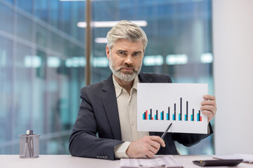 Professional presenting statistical data analysis in modern corporate office setting