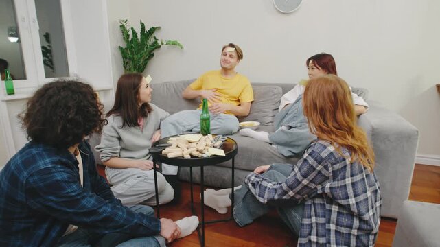 A lively group of friends gathers for an exciting game night, sharing drinks and laughter while engaging in friendly competition, creating unforgettable moments of joy and camaraderie