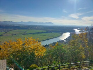 autumn landscape with mountains and river