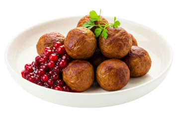 Classic homemade meatballs with red berry sauce and parsley garnish isolated on a transparent background