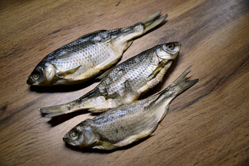 Dry salted fish displayed in a busy market stall , market, seafood, salted fish, dry, traditional, preserved