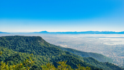 
Rio de Janeiro, Brazil - May 20, 2025: View to the lagoon from Christ the Redeemer statue in Corcovado Mountain, Rio. de Janeiro, Brazil. With beautiful blue skies during winter. 