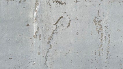 old peeling white wall texture with cracked paint and weathered surface