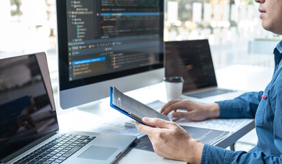 Professional Development programmer working in programming website a software and coding...