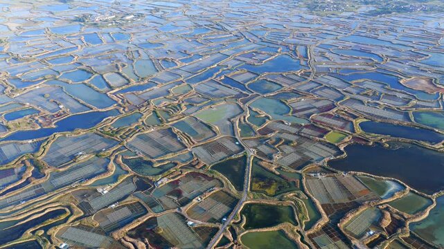 Aerial view of the salt fields of Guerande France at sunset