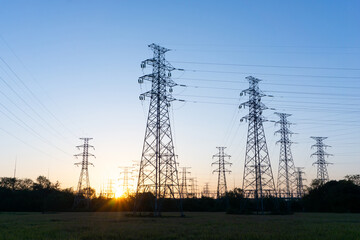 silhouette of pylon with sunset