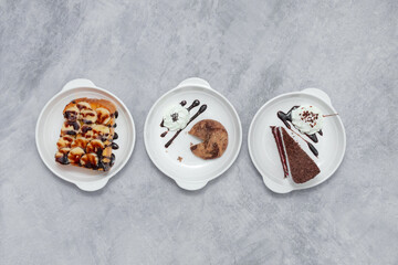 Sweet dessert cake made from wheat flour, butter, egg and topped with chocolate.