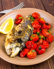 Baked fish with cherry tomatoes