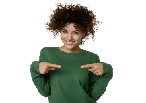 Smiling young woman with curly hair pointing downward, isolated on transparent background