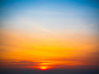 Obraz premium Sky sunset evening sunrise cloud weather dramatic landscape goldent and indigo color gradient pastel horizon, twilight yellow golden reflection morning nature environment energy ecosystem change