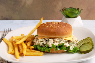 chicken  salad sandwich  with french fries