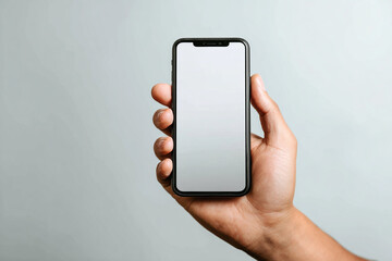 Hand gripping smartphone showing editable screen for digital content.