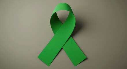Show your support with this vibrant green ribbon, ideal for awareness campaigns, charitable causes, and conveying solidarity with important health initiatives and environmental movements
