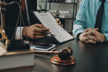 Lawyer explained to the client about the law that must be brought against the court case.
