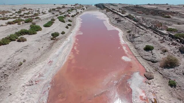 Raw Oblique Drone of Desert Drainage Canal with Red Brine and Salt Crusts for Harmful Algal Bloom and Hypersalinity Water-Quality Assessment
