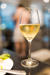 Refreshing white wine on table