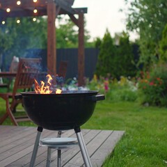 Backyard barbecue in a garden setting