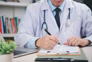 Doctor in white coat signing medical agreement on desk, confirming approval, patient data record, healthcare validation, legal documentation, official certification, hospital paperwork.