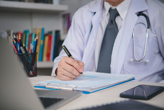Medical worker filling out document on clipboard, patient record writing, healthcare administration, hospital paperwork, legal documentation and professional medical service concept.