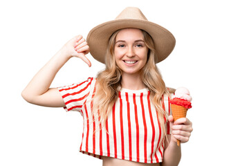 Young English woman with a cornet ice cream over isolated background proud and self-satisfied