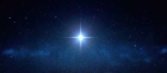 A bright, central star shines brilliantly in a dark, starry night sky
