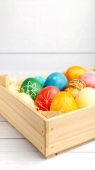 Colorful Easter eggs in a wooden crate