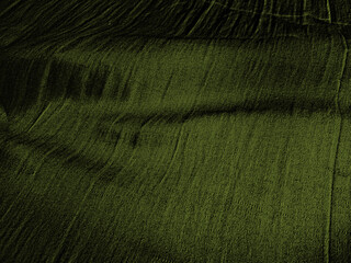 green linen textured fabric with folds and fine textile details