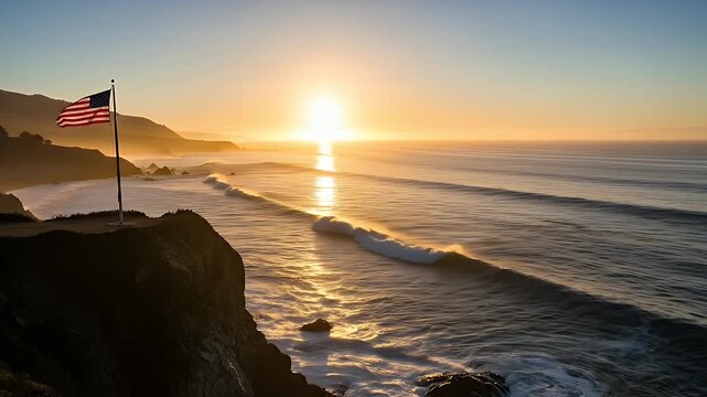 The American flag flying on a coastal cliff with a beautiful golden sunset over the ocean