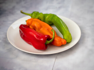 red and green peppers on a plate