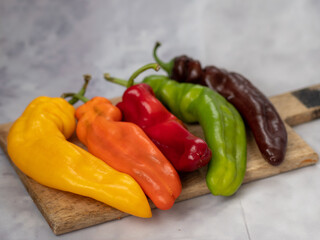 red hot chili peppers on wooden background