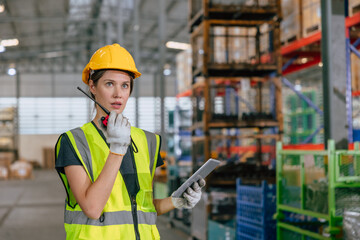 women warehouse worker, professional supervisor working control operate factory cargo loading