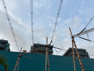 Industrial landscape with power lines electricity generation infrastructure featuring electrical...