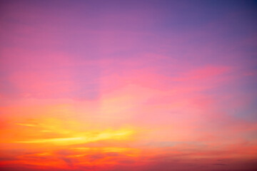 Obraz premium Beautiful , luxury soft gradient orange gold clouds and sunlight on the blue sky perfect for the background, take in evening,Twilight, Large size, high definition landscape photo