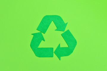 Recycling symbol made of felt. Close-up. Ecology concept.