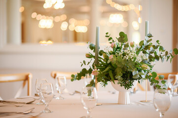 Elegant Table Setting with Floral Centerpiece