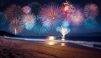spectacular fireworks display over a beach at night