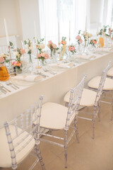 Elegant Wedding Table Setting with Floral Arrangements